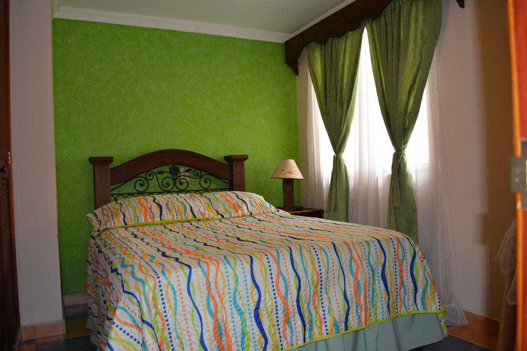 Hotel Casa Colonial Santa Rosa De Cabal Habitación foto